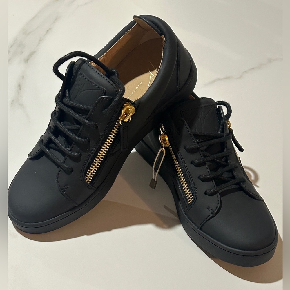Giuseppe Zanotti Black and Gold Sneakers with Sleek Design
